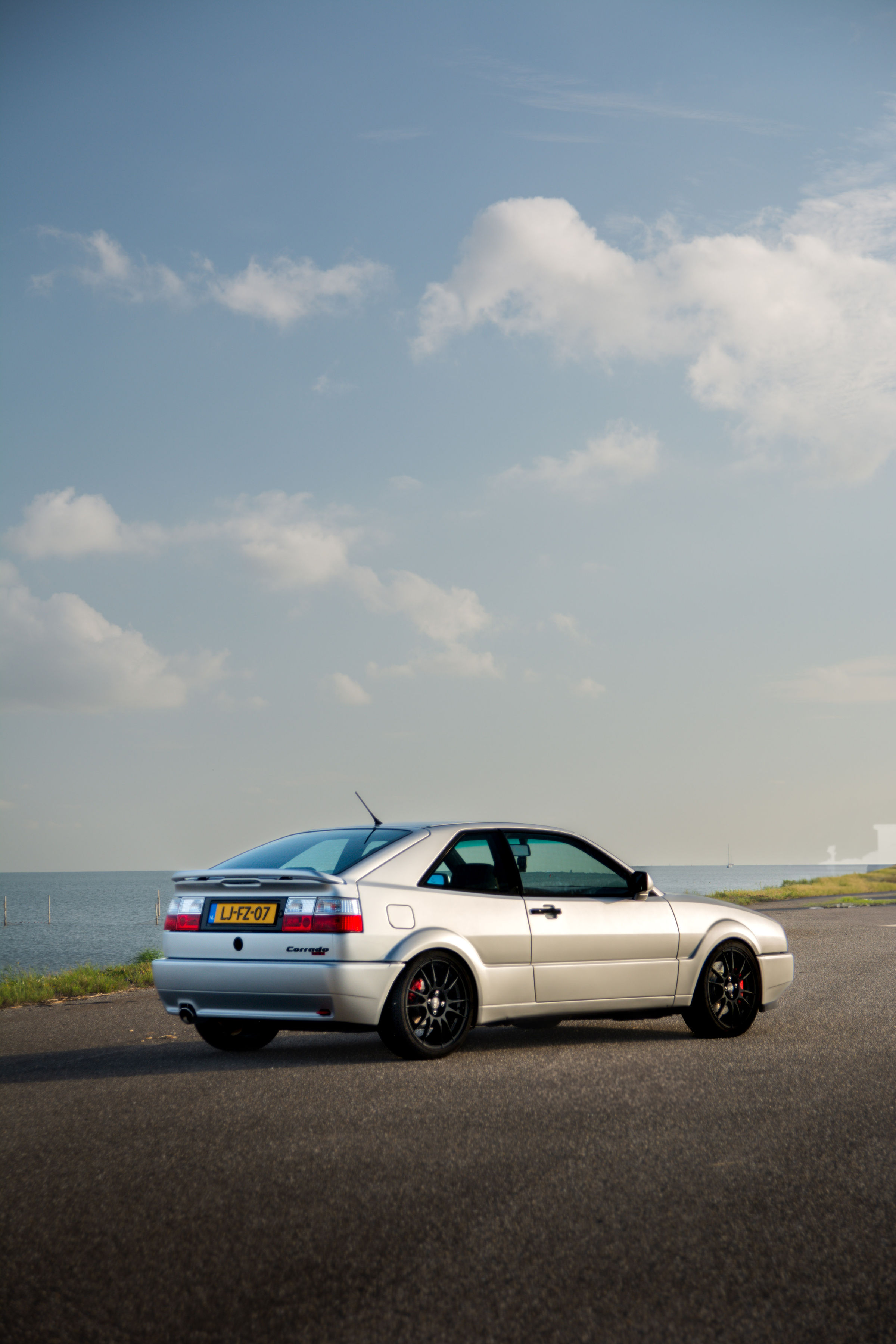 VW Corrado rear three-quarter by the water